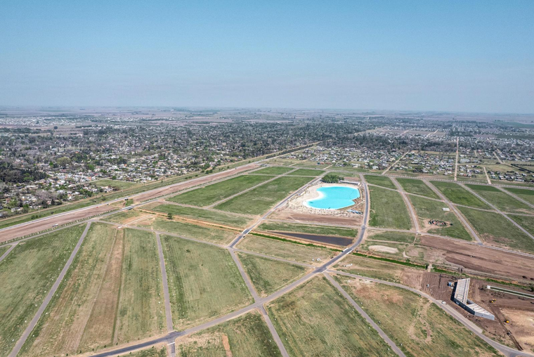 Terreno con frente Sur y perfecta ubicación en Vida Lagoon, Funes